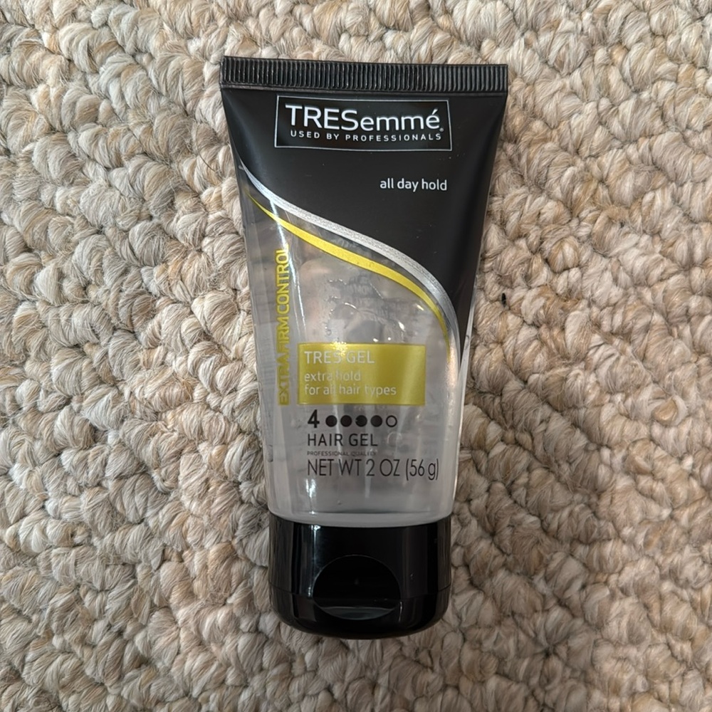 Travel size TRESemmé hair gel, extra hold nearly full bottle